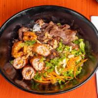 Pork Trio Bowl-Pork, Shrimp, Egg Roll · Your choice of base with lettuce, cucumber, pickled carrot, onion, fried shallot, and crushe...
