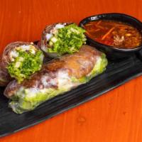 Spring Rolls · Vermicelli, lettuce, cucumber & fried shallot wrapped in rice paper. Served with house sauce...