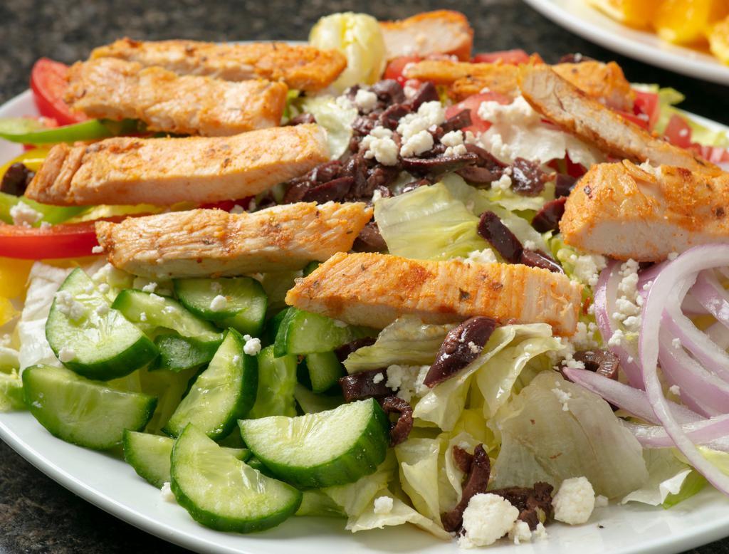 Chicken Greek Salad · Freshly grilled chicken breast on a Greek salad.