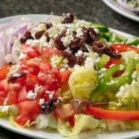 Greek Salad · Romaine lettuce, feta cheese, tomatoes, onions, bell peppers, cucumbers & kalamata olives.