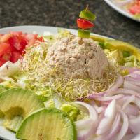 Tuna Salad · Albacore tuna salad, romaine, tomatoes, alfalfa sprouts, onions & avocado.