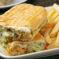 Pesto Chicken Panini · Our house made pesto with fresh grilled chicken breast with mayo & mozzarella cheese.