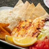 Grilled Tilapia · A moist fillet of tilapia grilled to perfection.