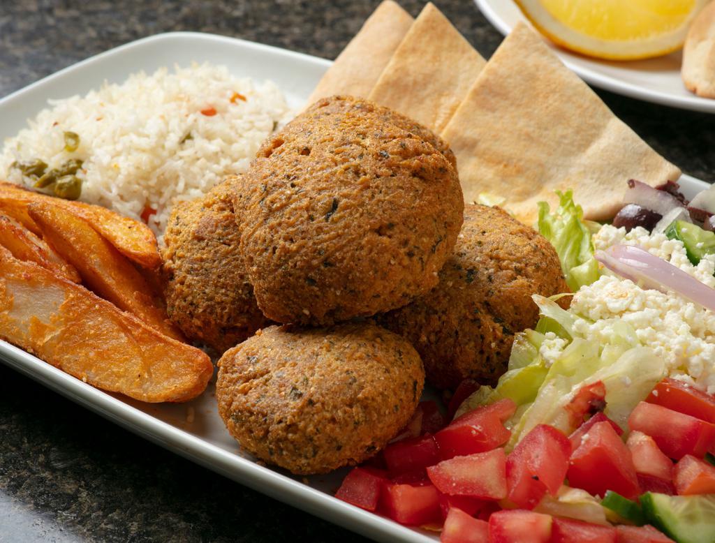 Falafel Plate · Vegetarian falafel made daily from garbanzo beans and spices served with Greek salad & rice, hummus, pickles and pita bread.