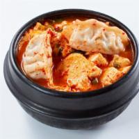 Dumpling Tofu Soup · Vegetable or beef dumpling. Topped with green onions. Vegetarian friendly (vegetable dumplin...