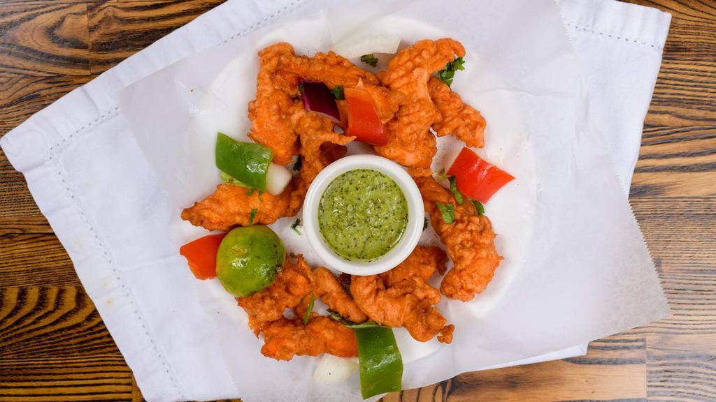 Chicken Pakora · Delicately spiced chicken fried in our chickpea batter.