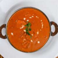 Chicken Tikka Masala · An alltime favorite from Punjabi, breast of chicken broiled clay oven and cooked in tomato c...