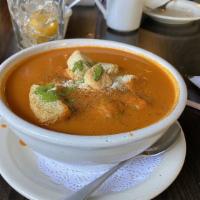Tomato Basil Bisque · With pesto, croutons and parmesan cheese.