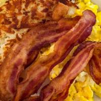 Breakfast Special · 2 Pancakes, 3 eggs & 2 Bacons or Sausage.