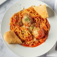 Spaghetti And Meatballs · Charlie’s meatballs, spaghetti pasta, home made marinara, parmigiano reggiano.