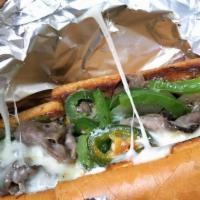 Philly Cheesesteak · Roast beef, sauteed onions, bell peppers, jalapenos, mayo, mozzarella.
