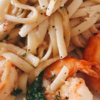 Garlic Shrimp Pasta · Linguini, garlic and chili flake marinated jumbo shrimp, chili flakes, lemon white wine sauce.