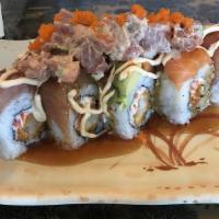 Gary'S Roll · Deep fried shrimp & snowcrab, topped with avocado, unagi, albacore, sake, spicy tuna, green ...