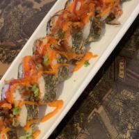 Godzilla Roll · Spicy hamachi mixed with green onions, wrapped in seaweed then deep fried. Topped with unagi...