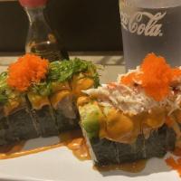 Nelsons Roll · Tempura shrimp, spicy hamachi and sprouts. Topped with sake, wakame, albacore, kani salad, u...
