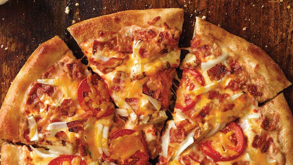 Crispy Thin Crust Chicken Fresco Pizza · Grilled chicken, bacon, onions, sliced tomatoes, our original sauce and signature three cheeses, plus cheddar