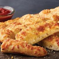 Cheezy Bread · Fresh-baked bread strips with our three-cheese blend and garlic butter, served with a side o...