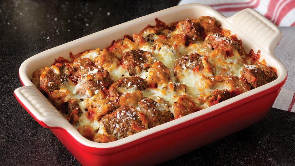 Meatball Bake · Marco's meatballs and sausage baked with our original sauce and signature three cheeses. Two servings. 880 cal. per serving.