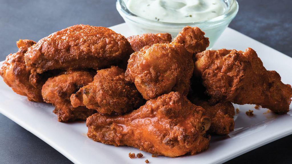 Chicken Wings (10 Pieces) · Classic chicken wings served hot or tangy BBQ style with your choice of dipping sauce. 100 cal. per piece.