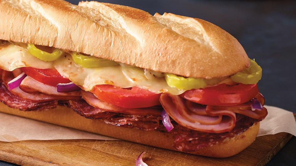 Italiano (12'') · Ham, salami, provolone cheese, banana peppers, tomatoes, red onions and sub dressing. 1460
 cal.