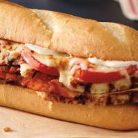 Chicken Club (12'') · Grilled chicken, bacon, tomatoes, mayo and our three-cheese blend. 1300 cal.