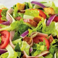 Family Italian Chef Salad · Fresh-cut lettuce blend, ham, salami, cheese, sliced tomatoes, onions and croutons. 220 cal ...