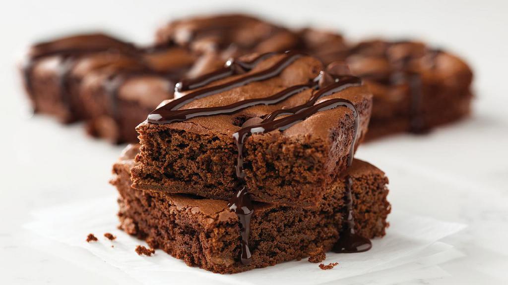 Double Chocolate Brownie · 320 cal. per serving. Made with Ghirardelli® chocolate and topped with a drizzle of Ghirardelli® chocolate sauce. 4 servings.