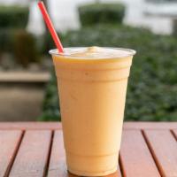 Tropical Smoothie · Orange juice, yogurt, pineapple, mango and banana.