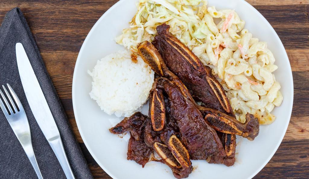Bbq Short Ribs · Regular plate lunch includes 2 scoops of rice and 1 scoop of macaroni salad. Mini plate lunch includes 1 scoop of rice and 1 scoop of macaroni salad.