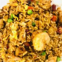 House Fried Rice · Rice, egg, peas, carrots, onion, BBQ pork, chicken, shrimp, stir-fried, and seasoned with so...