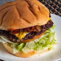 Bacon Cheese Burger · Handmade hamburger 1/3 pound of 100% ground beef. fresh with lettuce bacon cheese tomato oni...