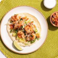 Baja Shrimp Taco Taco (3) · Baja fried shrimp tacos with pico de gallo, chopped cabbage, cream.