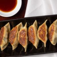 Pan Fried Dumplings · Six pieces.
