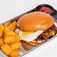 Breakfast Burger Breakfast Sandwich · Burger patty, fried egg, American cheese, grilled onions and bacon on a toasted brioche bun.