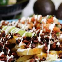 Crazy Fries · Fries covered in Melted cheese, Pico De Gallo, Guacamole, Sour Cream, and Refried Beans