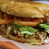Regular Torta · Your choice of meat, fried beans, lettuce, tomato, avocado, sour cream.