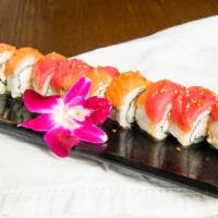 Autumn Roll (8 Pc) · Top: salmon, tuna, and avocado with sashimi sauce. Inside: shredded crab, cucumber, and avoc...
