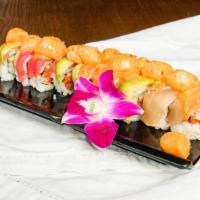 Ocean Reef Roll (8 Pc) · Top: assorted fish with spicy scallops and massago. Inside: spicy tuna and cucumber.