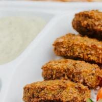 Falafel Plate · Make it your own. Start with our crispy golden falafel balls made from chickpeas and Mediter...