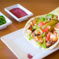Tekah Chicken Jumbo Wrap · Marinated & spiced cubes of chicken tenders fillet grilled to perfection over fire, served i...