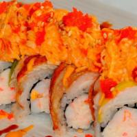 Tornado Roll · Inside: crab meat, shrimp tempura, avocado. Outside: eel, white tuna, shrimp. Spiey crab wit...