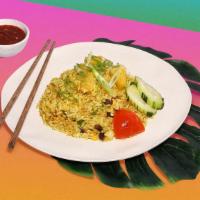 Vegan Pineapple Fried Rice · Vegan fried rice with pineapple, cashews, and your choice of tofu or vegetables.