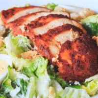 Herb Grilled Chicken Caesar Salad · Your choice of either house battered fried chicken or herb grilled chicken, parmesan cheese,...