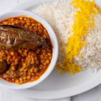Gheymeh Bademjan · Eggplant, chunks of beef and split peas cooked with tomato paste.