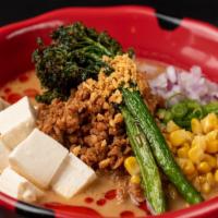 Flying Vegan Harvest · Vegan miso broth; soy meat, tofu, bean sprouts, broccolini, green onion, corn, red onion, cr...