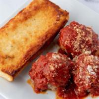 Beef Meatballs · Three 100% angus beef meatballs with ragu sauce, served with garlic bread toast