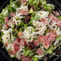Chopped Marino Salad · Chopped lettuces, mozzarella, salame, tomato, olives, garbanzo, house dressing.