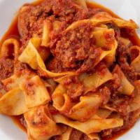 Pappardelle Bolognese · Pappardelle meat sauce.