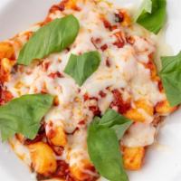 Gnocchi Sorrentina · Homemade potato gnocchi with tomato sauce, basil and melted mozzarella.