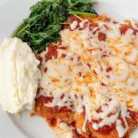 Chicken Parmigiana · Breaded chicken breast with marinara, topped with melted mozzarella.